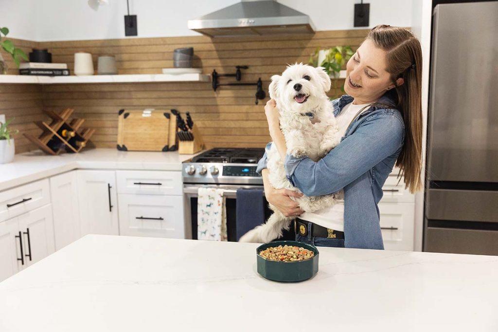 dog and human in kitchen